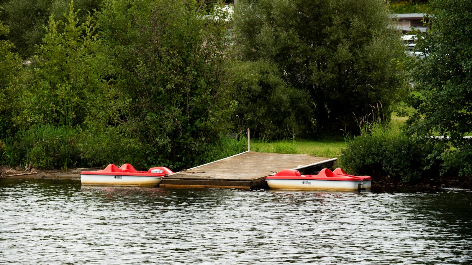 a couple of boats that are sitting in the water